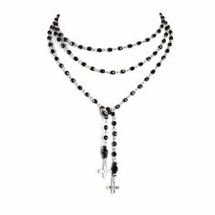 The Peace Cross Collection is for those Virgins Saints & Angels who seek a balance in harmony and union. Two even-sided crosses, dubbed the Peace Cross. This necklace can be worn long or short, wrapped as a bracelet, or even tied in a bow. The necklace is hand assembled in Mexico using Austrian sourced crystal beads. Cross Shaped Beaded Chain For Jewelry Making, Cross-shaped Beaded Chain For Jewelry Making, Adjustable Cross Necklace With Black Beads, Adjustable Black Beads Cross Necklace, Cross-shaped Faceted Beads For Jewelry Making, Spiritual Black Lariat Necklace, Spiritual Beaded Lariat Chain Jewelry, Adjustable Cross Lariat Necklace, Spiritual Beaded Cross Pendant Necklace