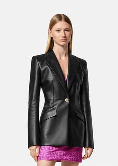 This single-breasted leather blazer is accented by Medusa hardware and has peaked lapels and a structured silhouette.