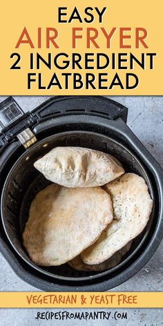 an air fryer with two uncooked flatbreads in it and the title overlay reads easy air fryer 2 ingredient flat bread