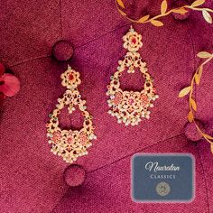 Giving out an elegant vibe owing to its sparkling stone mix! A versatile pair of earrings encrusted with nauratan stones and pearl moti. Approximate earrings length is 4". Pair Niti Earrings with Zehna Teekah for a complete festive look. Gold-plated on high-quality brass as base metal. Made by order. Kindly allow 4-6 weeks for the delivery of this item. For custom or urgent requests, please contact support@alacouture.com. *Please Note: We use faux stones and beads in all of our jewelry. Festive Jeweled Chandbali Pearl Earrings, Fusion Style Pearl Drop Danglers For Celebrations, Fusion Style Jeweled Jhumkas For Festivals, Fusion Style Pearl Earrings With Meenakari For Celebration, Fusion Style Meenakari Pearl Earrings For Celebrations, Fusion Style Pearl Drop Chandbalis For Festivals, Fusion Pearl Earrings With Meenakari For Celebrations, Fusion Style Pearl Drop Chandbalis For Celebrations, Festival Jeweled Chandbali Pearl Earrings