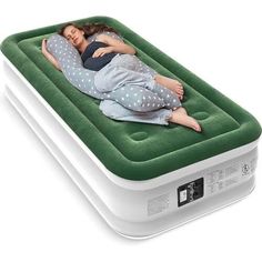 an inflatable mattress with a woman sleeping on it