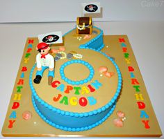 a birthday cake with a pirate theme on it