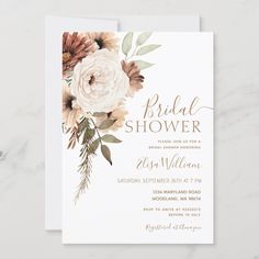 an elegant floral bridal shower card with gold foil lettering and watercolor flowers on it