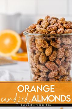 orange candied almonds in a glass jar