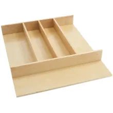 an empty wooden drawer with compartments on it