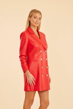 This season, mix it up with a nod to retro glamour in our Faux Leather Blazer Dress, a chic piece that channels the bold spirit of the ‘80s. This edgy blazer dress boasts a structured silhouette with a faux leather finish, perfect for making a statement while keeping warm this season. It features a double-breasted design with metallic buttons, and ruched sleeves for even more of a vintage flair. Faux leather Double-breasted Metallic buttons Ruched three-quarter sleeves Available in Black and Sca Fitted Double-breasted Blazer Dress For Night Out, Notch Lapel Double-breasted Blazer Dress For Night Out, Chic Mini Length Blazer With Button Closure, Night Out Blazer Dress With Notch Lapel, Chic Mini-length Blazer With Button Closure, Chic Fitted Blazer Dress With Double Button Closure, Notch Lapel Blazer Dress For Night Out, Chic Double-breasted Blazer Dress For Date Night, Spring Double-breasted Blazer Dress For Night Out