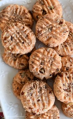 a white plate topped with cookies on top of a table