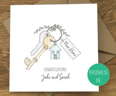 a card with an illustration of a house and keys on it, which says congratulations