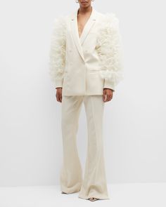 Introducing our elegant Women's White Wedding Suit, the epitome of sophistication and style for your special day or formal occasions. Crafted with meticulous attention to detail, this suit exudes timeless grace and modern flair, making you the center of attention wherever you go. Key Features: Detailed Ruffled Sleeves: Delicate ruffles adorn the sleeves, adding a touch of romance and femininity to the ensemble. Each ruffle is expertly crafted to create a stunning visual impact. Wide-Leg Pantsuit Double Breasted Wedding Suit, Prom Suit And Dress, Bridal Pantsuit, White Wedding Suit, Structured Jacket, Womens Office, Crepe Blazer, Organza Sleeves, Womens Suits