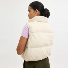 A comfortable style for cooler weather this down-filled puffer vest features a protective funnel collar for extra warmth. Finished with slip pockets the sporty zip-front style is crafted of recycled polyamide part of our commitment to rethinking and reducing our impact on the planet. | Coach Puffer Vest In Recycled Polyamide - Women's Size XL - Cream Puffer Vest White, Cotton Puffer Vest, High Neck Cropped Puffer Vest, Cream Color Puffer Vest, Puffer Vest Yellow, Cooler Weather, Puffer Vest, Comfortable Fashion, Puffer