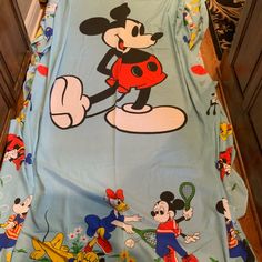 the mickey mouse bed spread is on display