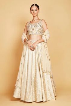 Shop for Amrin khan Gold Floral Corset Blouse And Lehenga Set for Women Online at Aza Fashions Gold Brocade Set With Sheer Dupatta, Festive Anarkali Sets In Brocade, Festive Anarkali Brocade Sets, Choli With Sheer Dupatta For Transitional Season, Transitional Wedding Anarkali Set With Unstitched Blouse, Transitional Season Wedding Anarkali Set With Unstitched Blouse, Festive Raw Silk Sets For Wedding, Transitional Season Sheer Dupatta Choli, Floor-length Brocade Sets For Diwali