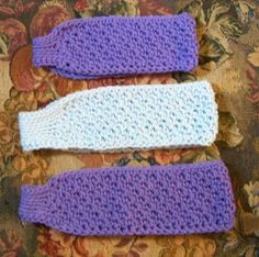 three crocheted headbands sitting on top of a couch