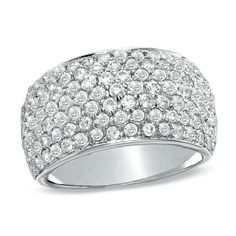 a white gold ring with round diamonds on the outside and inside, set in 18k white gold