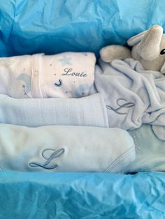 The perfect gift for every new baby boy. This personalised gift set includes  2 personalised sleepsuits Personalised comforter  Personalised blanket Bib Hat Mittens Perfectly wrapped in a blue gift box with tissue paper All clothing in the gift set is all 100% cotton to give that soft and cosy feel that we all want for babies. Personalised Blanket, Personalized Baby Boy Gifts, Personalized Baby Boy, Baby Boy Gift, Personalised Baby, New Baby Boys, Blue Gift, Personalised Blankets, Clothing Sets