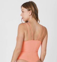 A daring seamless one size bodysuit with a V neckline and chic strappy details that will elevate your everyday look with a touch of glamour. one size seamless bodysuit ultra soft v neckline double straps one size fits most (0-18) 92% nylon 8% spandex hand wash cold, air dry Strappy Bodysuit, Seamless Bodysuit, Strap Bodysuit, Cold Air, V Neckline, Golden Hour, Air Dry, Everyday Look, Hand Wash