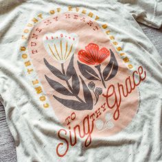 This lightweight, tri-blend tee is so comfy with just the right amount of stretch. The heathered fabric and soft print creates the perfect vintage feel. Oatmeal heathered color tee with full color print Come Thou Fount of Every BlessingTune My Heart to Sing Thy GraceMaterialTri-blend construction (50% polyester/25% combed ring-spun cotton/25% rayon)Contemporary/modern unisex fit CareWe use the latest direct-to-garment (DTG) printing technology and high-quality inks that won't fade for a long tim Come Thou Fount, Colorful Bouquet, Dtg Printing, Christian Clothing, Color Print, Quilt Block, Christian Shirts, Star Designs, Shirt Ideas