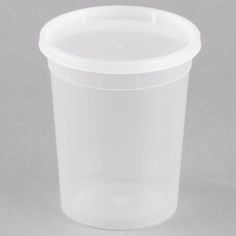 a clear plastic cup with no lid on a gray background, showing the inside of the cup