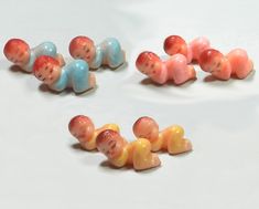 four candy candies arranged in the shape of people