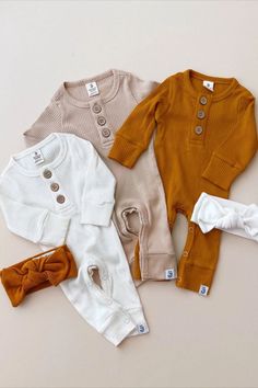 Organic Jumpsuits for Fall 🍂🧸 Made from an ultra cozy blend of organic ribbed cotton. Sizes from newborn up to 18 months. Available in 3 colors. Tap to shop 🤍 #luckypandakids #reels #fallstyle #babystyle #babyreels #kidsreels #organicbaby #organicbabyclothes #babyjumpsuit #babyromper #babyrompers Baby Information, Neutral Baby Clothes, Baby Jumpsuit, Organic Baby Clothes, Gender Neutral Baby Clothes, Camel Color, Organic Baby