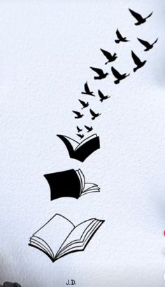 birds flying over an open book with it's pages spread out to fly through the air