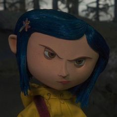 an animated doll with blue hair wearing a yellow shirt and red tie, looking at the camera