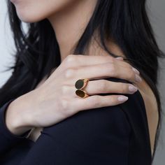 Step into bold elegance with TABAYER's Oera Statement Ring, crafted from Fairmined 18K yellow gold. This striking piece boasts a sleek, contemporary design, perfect for making a sophisticated statement. • Fairmined 18k yellow gold • In stock in size 5.5. Additional sizes are made to order, please allow 2-4 weeks for delivery. Every TABAYER piece is handcrafted in Italy with meticulous care using 100% artisanal Fairmined gold, ensuring the smallest ecological footprint possible. Luxury Open Ring For Everyday, Fine Jewelry Rings With Polished Finish For Everyday Luxury, Minimalist Gold Plated Dome Ring For Formal Events, Polished Finish Fine Jewelry Rings For Everyday Luxury, Polished Finish Luxury Rings Fine Jewelry, Modern Oval Jewelry For Formal Occasions, Modern Tarnish Resistant Gold Plated Rings, Modern Rose Gold Open Dome Ring, Luxury 14k Gold Open Signet Ring