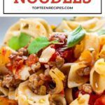 pasta with meat and vegetables is shown on the cover of this recipe for noodle salad