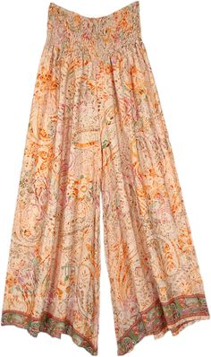 Abstract floral and paisley prints on wide-leg pants which are soft and flowy, and have a smocked waist.  The loose-fit wide-leg printed rayon pants have a comfortable waist that will fit a small to a large. #tlb #SplitSkirtsPants #beachwrap #Printed #bohemianfashion #festivalpants Bohemian Spring Pants With Paisley Print, Bohemian Summer Pants With Paisley Print, Summer Beach Pants With Paisley Print, Bohemian Paisley Print Summer Pants, Bohemian Beach Pants With Paisley Print, Paisley Print Long Pants For Vacation, Spring Beach Bottoms With Paisley Print, Bohemian Paisley Print Pants For Vacation, Paisley Print Vacation Bottoms