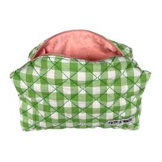 Our Kami quilted cosmetic bag is the perfect travel essential to store your cosmetics, skincare, or phone. The soft terry cloth interior helps to protect your items from smudges and scratches. The gingham fabric exterior makes it easy to spot in your purse or overnight bag. This bag makes a great gift for anyone who wants to stay organized while traveling or just at home—they also look cute displayed on your vanity! Outer Fabric: Cotton Inner Fabric: Terry Cloth Dimensions: 9.1" L x 4.7" W x 3.9 Quilted Cosmetic Bag, Tech Jewelry, Cosmetics Skincare, Gingham Fabric, Overnight Bag, Sunglasses Shop, Green Bag, Terry Cloth, Travel Essentials