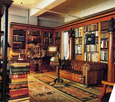 a living room filled with lots of books