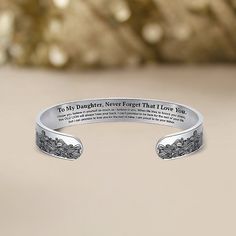 If you're looking for a special and meaningful gift to show your daughter how much she means to you and how proud you are of her accomplishments, this bracelet is a perfect choice. The stunning bracelet design is not only aesthetically pleasing but also a perfect reminder for your daughter that no matter what life throws her way, you'll always have her back. Whether it's her birthday, graduation, or just because, this bracelet is sure to become one of her favorites. Why buy from us?: Crafted In Dad Bracelet, Bracelet Design, Proud Of You, What Is Life About, Bracelet Designs, Meaningful Gifts, Aesthetically Pleasing, My Daughter, One Size Fits All