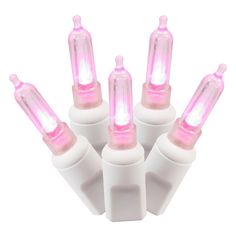 six pink light bulbs on white background