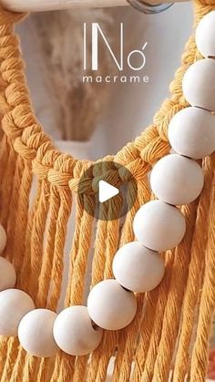 a close up of a mirror with macrame beads on it and an image of the macrame bead