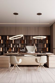 an office with two chairs and a desk in front of a book shelf filled with books