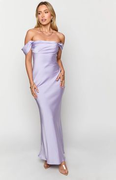 Lilac Off Shoulder Formal Dress

How to style:
Impress the crowd at your next formal event in our exquisite Lilac Formal Dress (). It is perfect for weddings, galas, or any special occasion. Pair it with your favourite gold jewellery () and nude heels (), and be ready to step out in style.

Features:


  
 * Light weight satin material
 
 * Maxi length
 
 * Non stretch
 
 * Bias cut skirt  
 * Gathered bust detailing  
 * Off the shoulder style
 
 * Fully lined bust - elsewhere unlined
 
 * Invisible zip on left side
 
 * Grip on inner bust Purple Lace Maxi Dress, Lilac Formal Dress, Purple Maxi Dress, 60's Dress, Prom Midi Dress, Bias Cut Skirt, Formal Dress Shops, Semi Formal Dresses, Strapless Tops