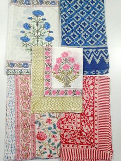 several different types of cloths with flowers on them