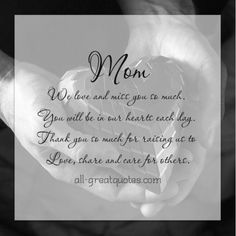 two hands holding a heart shaped object with the words mom written in black and white