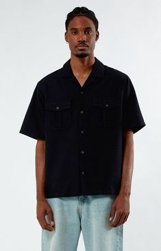 PacSun has you covered on your next outing with the new Oversized Black Camp Shirt. This shirt is designed with a collared neckline, short sleeves, dual chest pockets with button closures, a relaxed fit, button closures, and a straight hem.Collared necklineShort sleevesRelaxed fitDual chest pocket with button closureButton closuresStraight hem60% cotton,30% polyester, 10% rayonMachine washableModel is wearing size mediumModel Measurements: 6'1â Height, 31â Waist, 32â Inseam PacSun Mens Oversized Black Camp Shirt size Medium Casual Button-up Camp Shirt With Pockets, Black Shirt With Buttoned Pockets And Relaxed Fit, Black Relaxed Fit Shirt With Buttoned Pockets, Black Tops With Buttoned Pockets And Relaxed Fit, Black Collared Shirt With Buttoned Pockets, Oversized Collared Shirt With Patch Pockets, Casual Black Shirt With Lapel Collar, Relaxed Fit Camp Shirt With Patch Pockets, Short Sleeve Button-up Shirt With Pockets For Summer