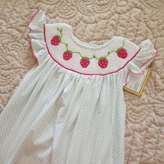 Nwt Babeeni Smocked Dress Cute Smocked Strawberry Mint Length 31" Strawberry Baby Dress, Playful Smocked Short Sleeve Dress, Sleeveless Smocked Dress With Smocked Cuffs, Cute Smocked Dress For Playtime, Cute Smocked Dress With Smocked Back For Playtime, White Smocked Dress For Playtime In Summer, White Smocked Dress For Summer Playtime, Playful White Smocked Dress, Cute Sleeveless Dress With Smocked Cuffs