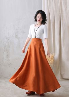 "You'll feel ultra chic and modern wearing the A Line skirt throughout the year, the long skirt will be a prefect on for your summer autumn. DETAIL * More colors available https://etsy.me/3ifY3Py * 100% pure linen * Two side pockets * Right Hidden Zipper closure * Back elastic waistband * Maxi linen skirt, long linen skirt, Plus size Skirt * Ankle length effect * Perfect for Summer, spring and Autumn * Machine Washable in Warm/Cold Water/Do not bleach /Mid-iron /Hang Dry *The model is 170 cm (5′ Chic Stretch Orange Skirt, Orange Stretch Lined Skirt, Stretch Orange Lined Skirt, Fitted Orange Pleated Skirt, Relaxed Orange Maxi Skirt, Fitted Orange Maxi Skirt, Fitted Orange Midi Skirt, Elegant Orange Skirt For Spring, Elegant Fitted Orange Maxi Skirt