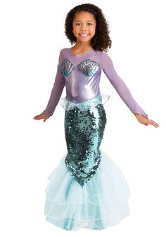 PRICES MAY VARY. Size: X-Small Enchanting Mermaid Transformation: Let your child dive into the world of fantasy with this stunning Pretty Purple Mermaid Costume. Easy Dressing: Features a convenient hook & loop fastener at the center back for hassle-free costume changes. Quality Materials: Crafted with 100% polyester, mesh yoke & sleeves, and sequined seashells for a truly captivating look. Shimmering Mermaid Elegance: The skirt front is adorned with dazzling sequins, making your child shine lik Girls Mermaid Costume, Princess Dress Fairytale, Fairy Tale Costumes, Mermaid Kids, Mermaid Halloween, Mermaid Outfit, Purple Mermaid, Princesa Disney, Mermaid Costume