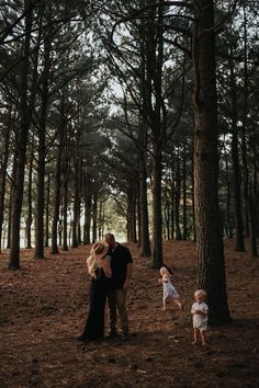 Woods photoshoot photography family photography Dark Fall Photoshoot Family, Enchanted Forest Family Photoshoot, Moody Fall Family Photoshoot, Pine Tree Family Photos, Forrest Family Photos, Dramatic Family Photoshoot, Forest Photo Shoot Family, Pine Tree Family Pictures, Family Photos In Woods