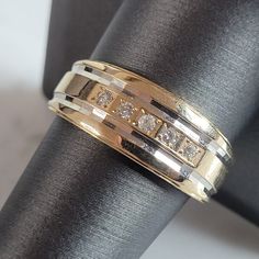 A Men's Vintage Estate 14k Yellow And White Gold Diamond Ring That Weighs 6.9g. The Ring Size Is A 10.25, And Is 3/8" Wide. Ring Is Stamped " 14k". There Are About .10cts Of Diamonds. Any Questions Please Dont Hesitate To Ask. Be Sure To Check Out Some Of My Other Great Items Up For Sale. Thank You. Anniversary Fine Jewelry Bands With Polished Finish, Formal Round 14k Stamped Bands, Anniversary Wide Band Channel Set Jewelry, Formal 14k Stamped Bands, White Gold Wide Band Formal Jewelry, Formal Wide Band Jewelry With Diamond Accents, Formal Jewelry With Diamond Accents And Wide Band, Polished Diamond Bands For Anniversary, Hallmarked Wide Band Jewelry For Anniversary