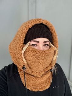 Balaclava - Sherpa FITS OVER HELMET! Fits over most adult helmets as well as over beanies  Hood made with Sherpa fleece Stay warm in style!  Wear with hood up or down, and face mask up or down  Pull strings with cord stops to stay tight  Adult size, fits most!  Beanie hat not included  100% polyester   Dry clean only!  *Pattern placement may vary Full Face Winter Hat For Outdoor Use, Outdoor Full Face Winter Hat, Winter Outdoor Full Face Hat, Hooded Outdoor Hat, One Size Fits Most, Windproof Full-face Hat For Cold Weather, Windproof Full Face Hat One Size, Windproof Full Face Hat For Cold Weather, Full Face Cold Weather Hat, One Size Fits Most, Brown Winter Bonnet For Outdoor Use