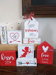 valentine's day decorations are displayed on a table