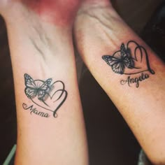 two matching tattoos with butterflies on their arms that say mama and daughter in the center