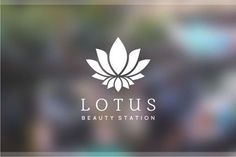 the lotus beauty station logo is shown on a blurry glass background with an image of a flower