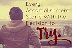 a person standing on top of a hill with the words every accomplishment starts with the decision to try