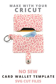 a pink and white leopard print card wallet with a keychain attached to it